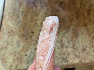 take meat filling out of sausage