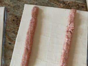 sausage meat on puff pastry sheet